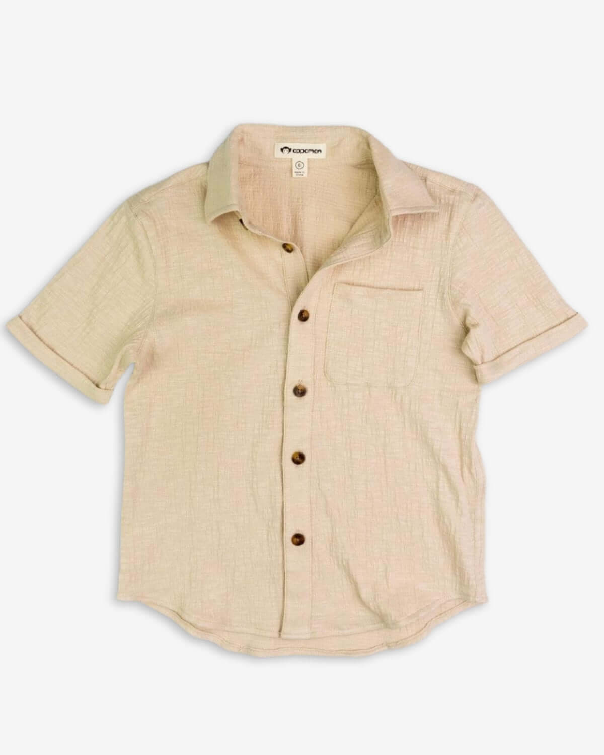 Stylish sand beach shirt for kids, featuring short sleeves and a patch pocket—perfect for laid-back adventures!