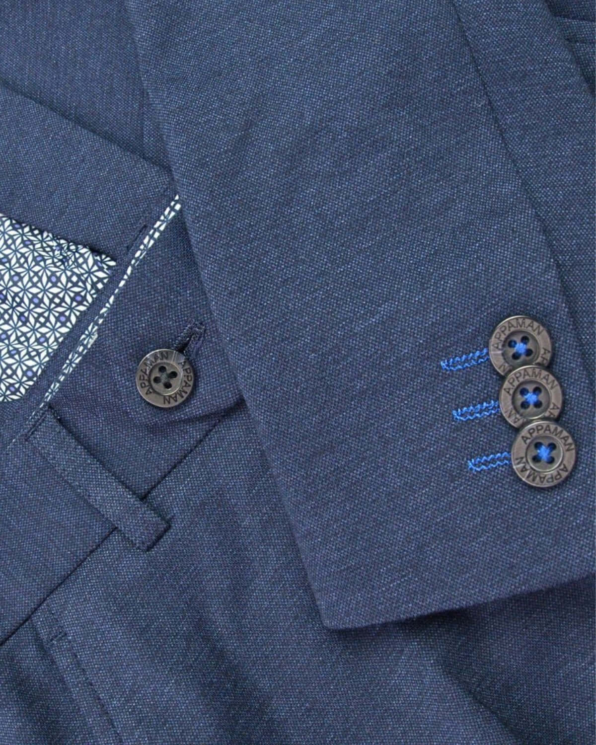 Close-up of the Appaman Stretchy Mod Suit featuring chic buttons and stylish detailing, perfect for kids' back to school fashion.