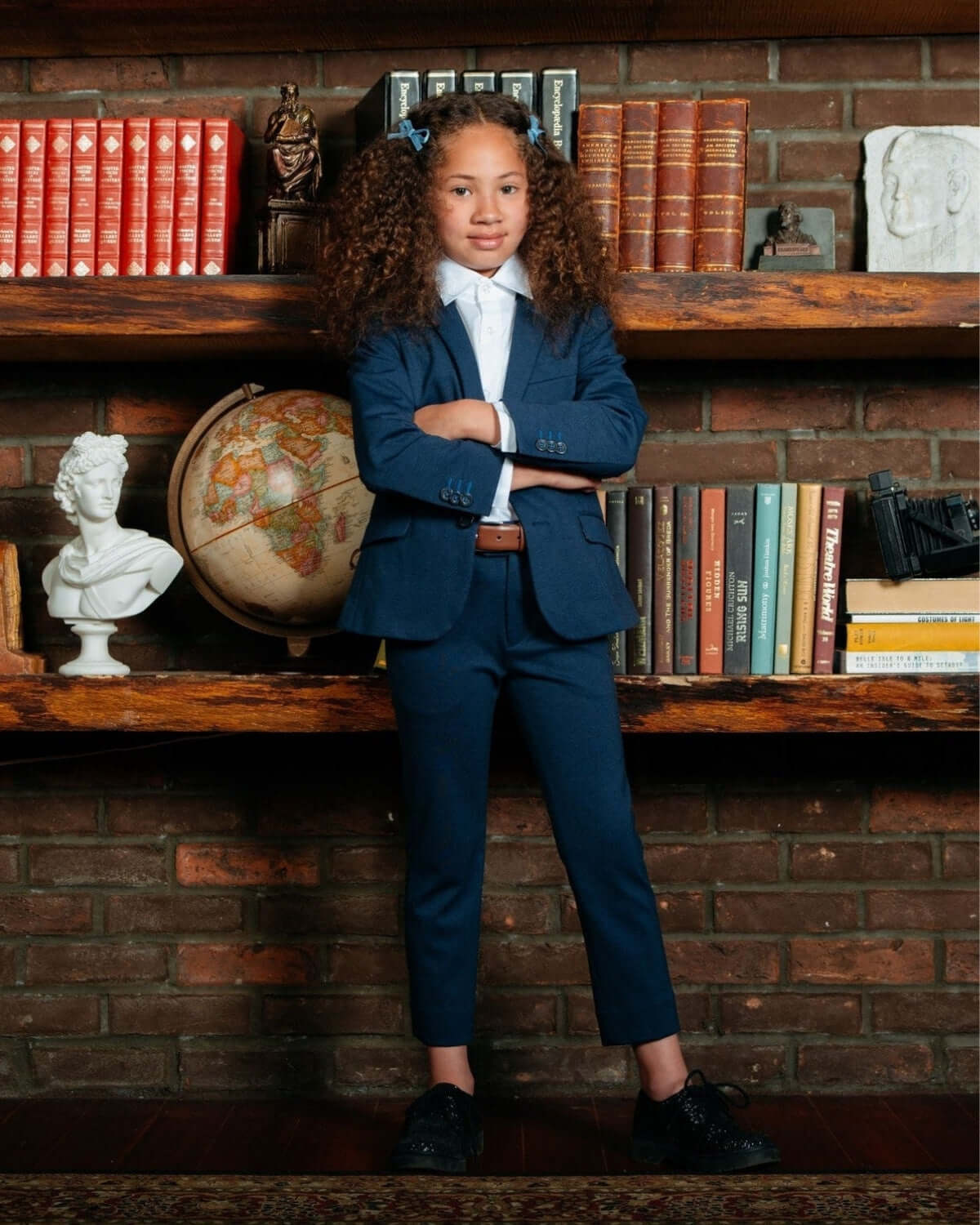 Stylish girl in a sleek blue mod suit, perfect for kids who love to move. A fun twist on high-quality kids clothes!