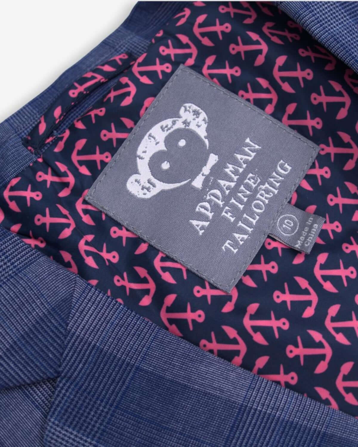 Inside view of the Indigo Glen Plaid Mod Suit showing the playful Appaman tailoring label—a stylish kids' staple!