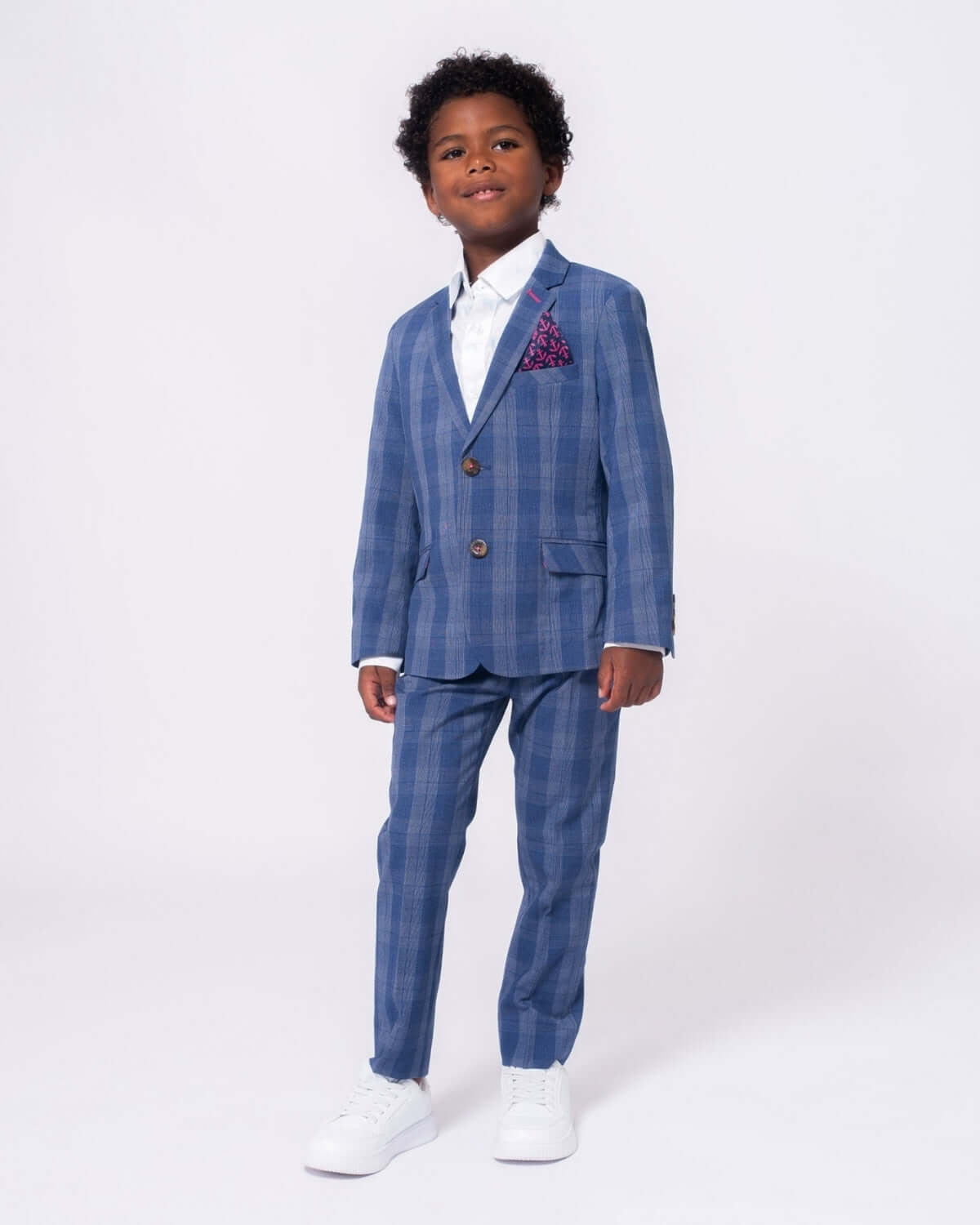 Indigo Glen Plaid Stretchy Mod Suit worn by a young boy, showcasing a stylish and comfortable design for special occasions.