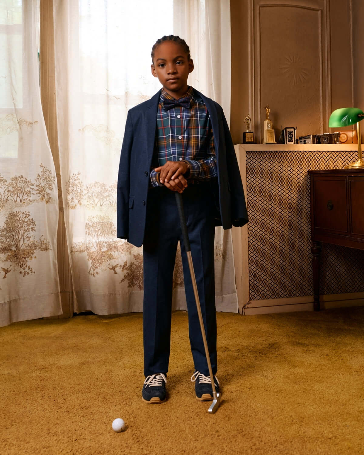 Stylish kid in Navy Diamonds Suit, ready to impress! A blend of fun and sophistication for dapper moments in life.