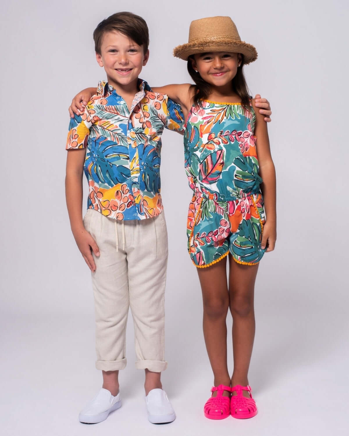 Stylish kids in vibrant floral outfits, exuding fun and confidence—perfect for playdates and family gatherings!
