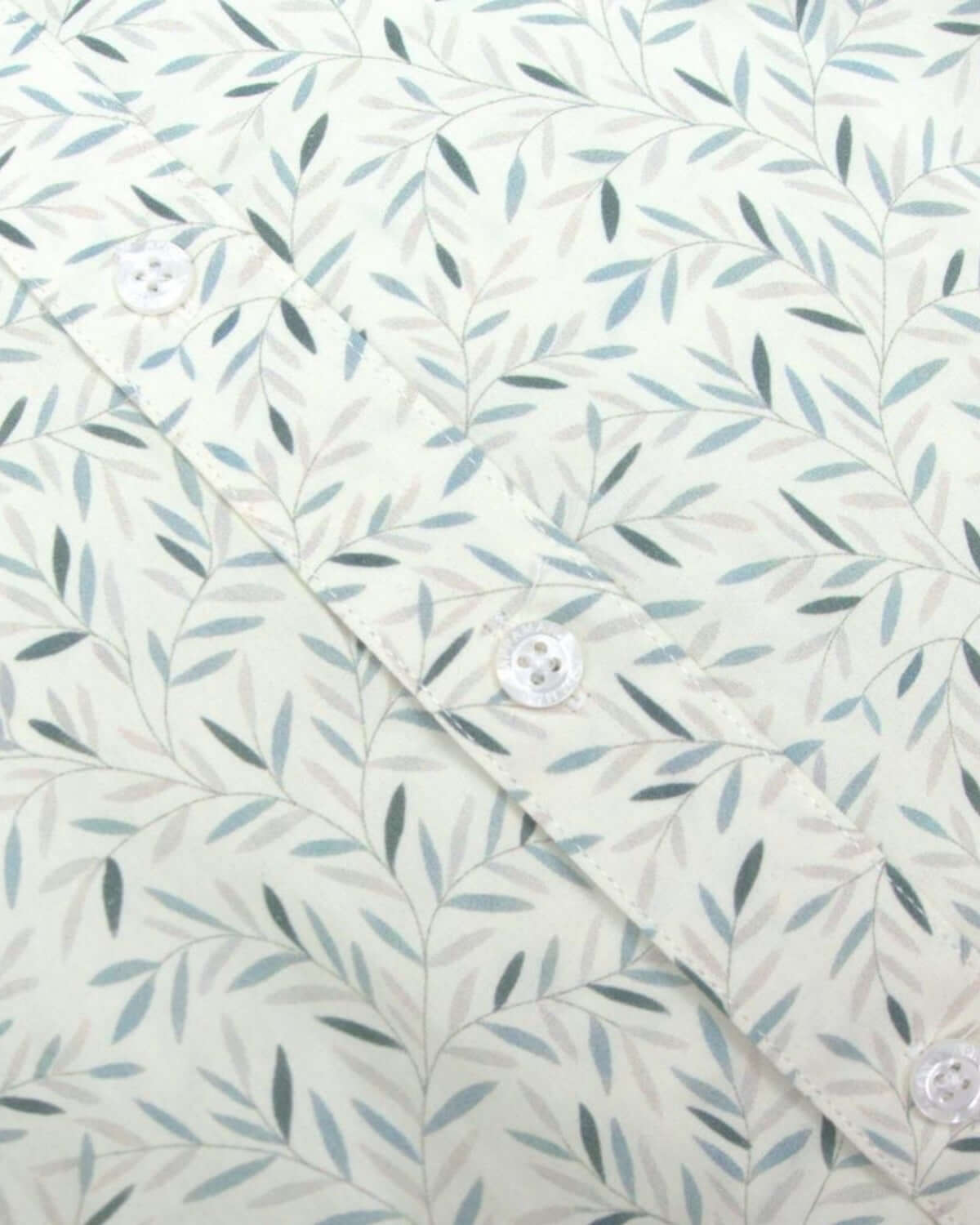 Close-up of Micro Greens Day Party Shirt with delicate leaf pattern, showcasing high-quality cotton fabric for stylish kids' wear.