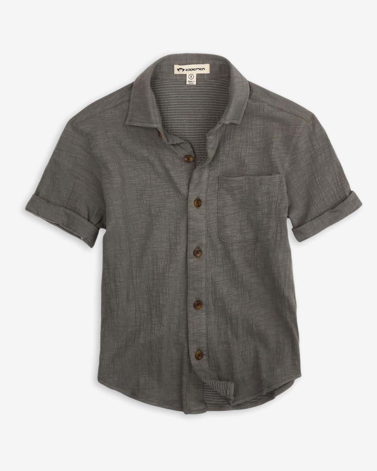Stylish sage beach shirt for kids—lightweight, breezy, and ready for sunny adventures!