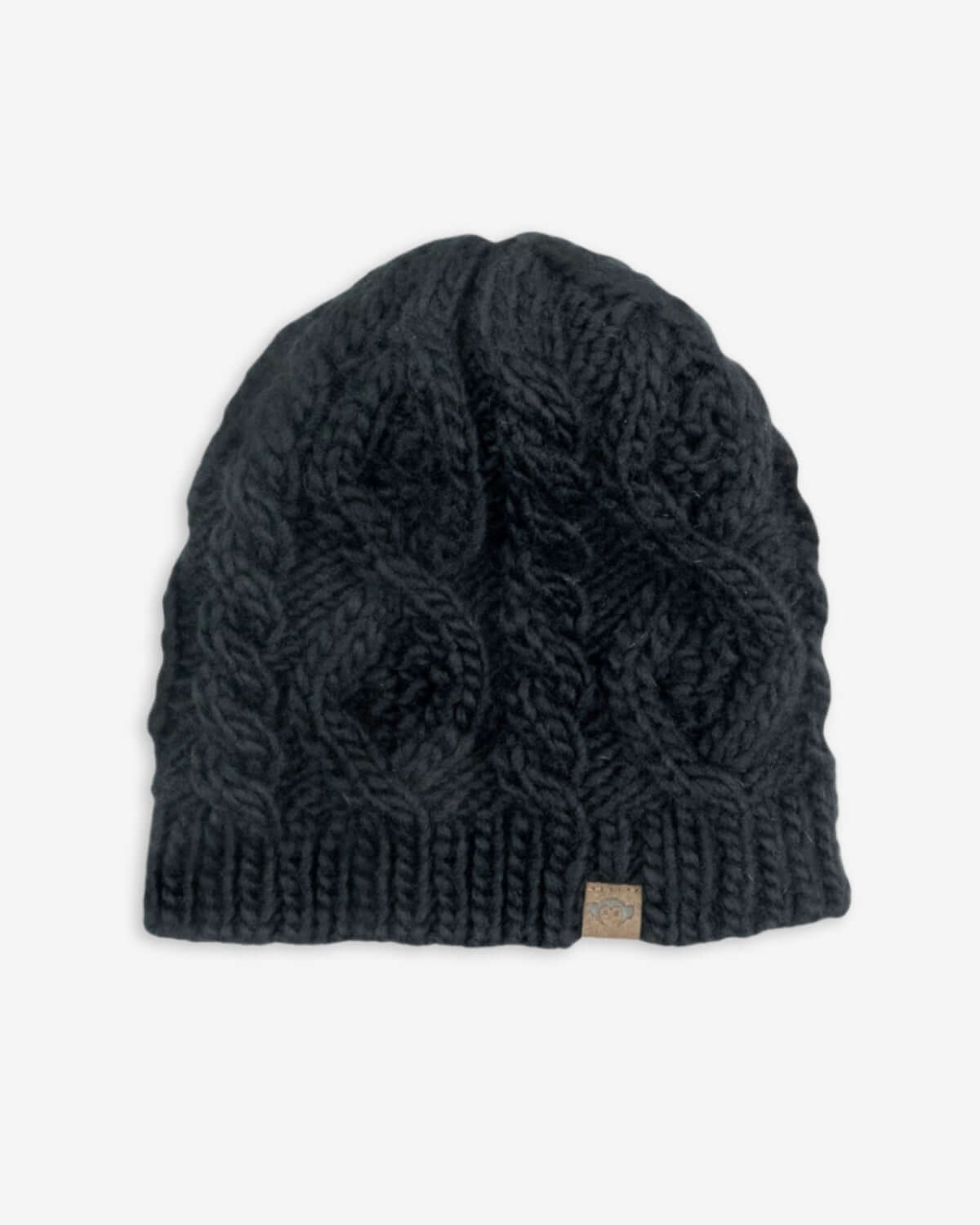 Girls' stylish black cable knit beanie, perfect for modern winter adventures and back-to-school fun!