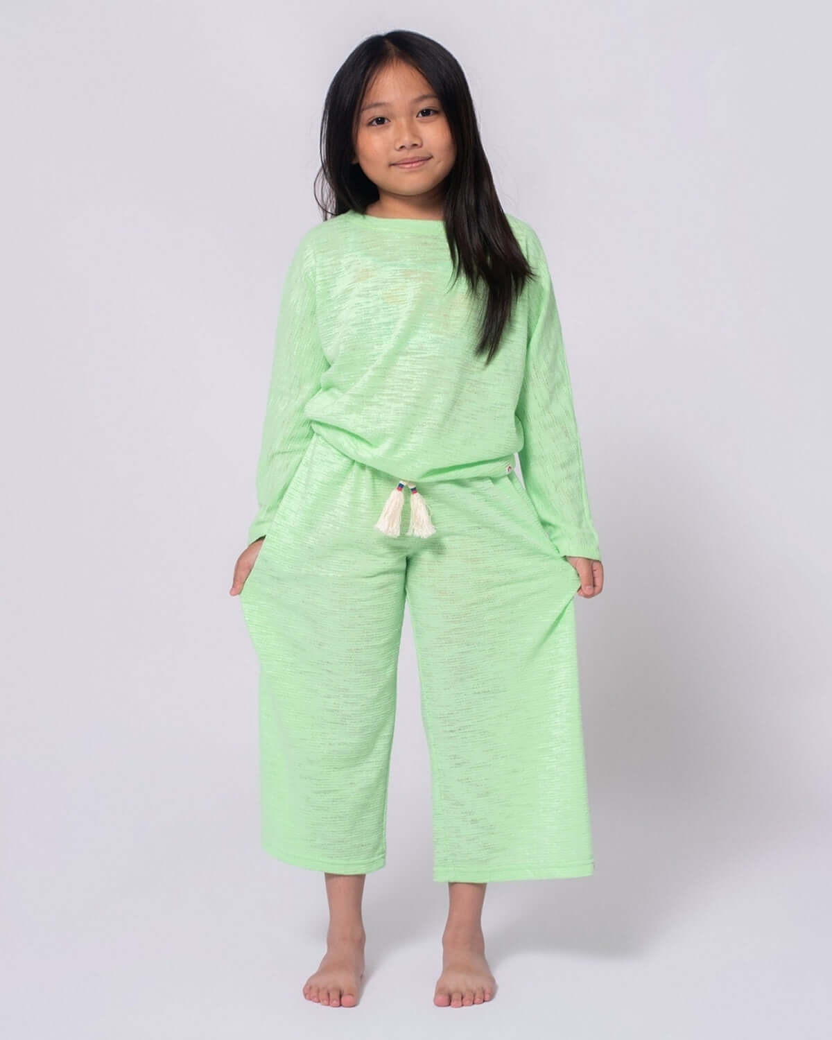 Girl wearing comfortable Mint Beach Pant and matching top, perfect for summer outings and beach adventures.