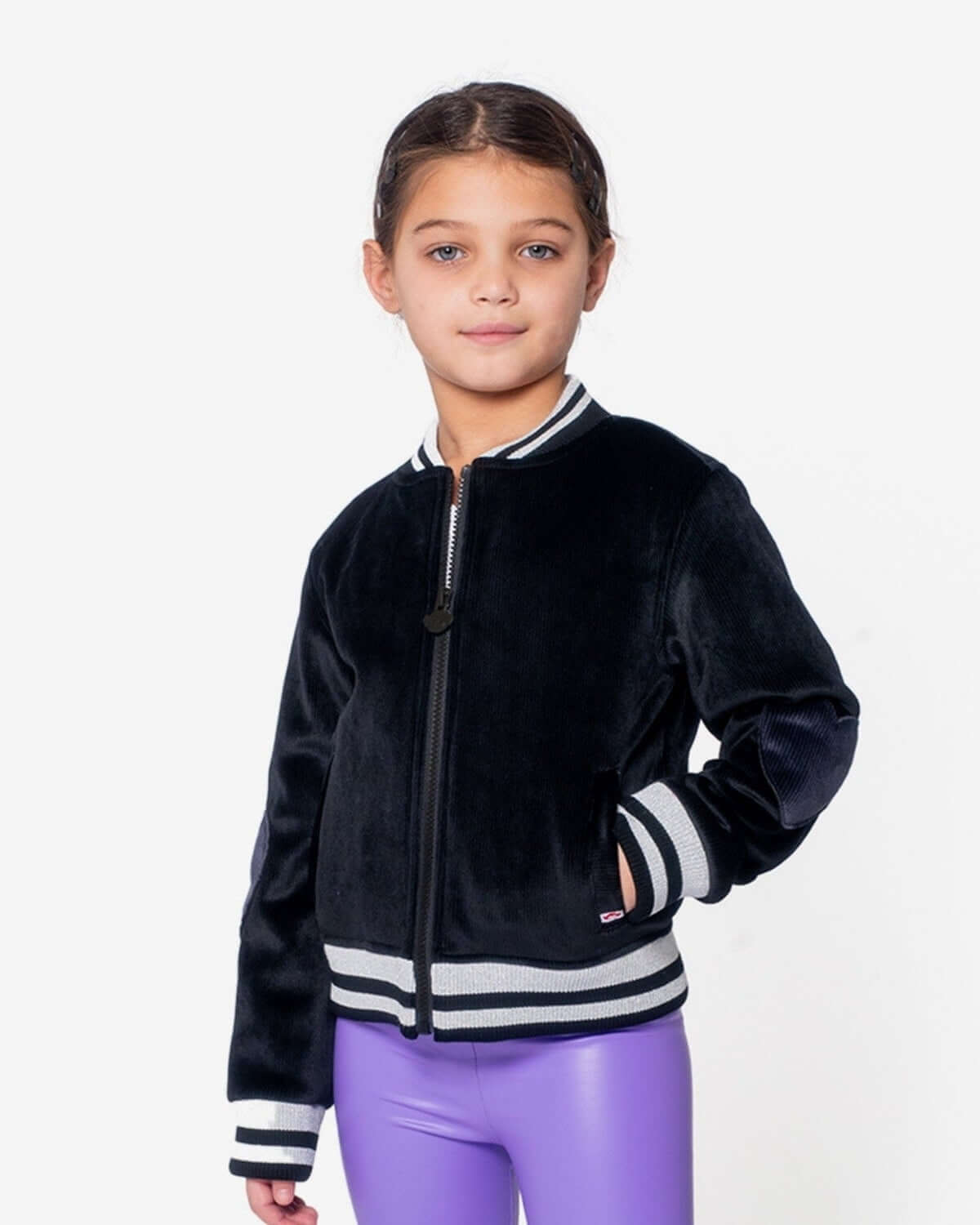 Chic black velvet Nikki Bomber Jacket with varsity ribbing and heart elbow patches, stylish kids clothes for back to school.