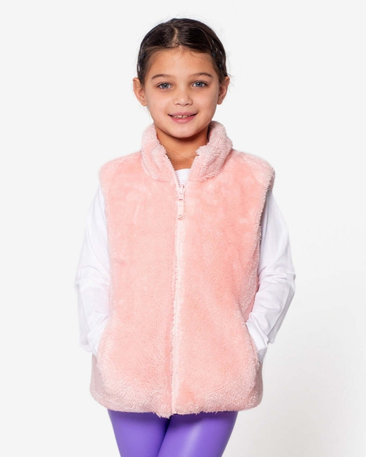 Cozy salmon pink faux fur reversible vest for girls, a stylish choice for back to school adventures!