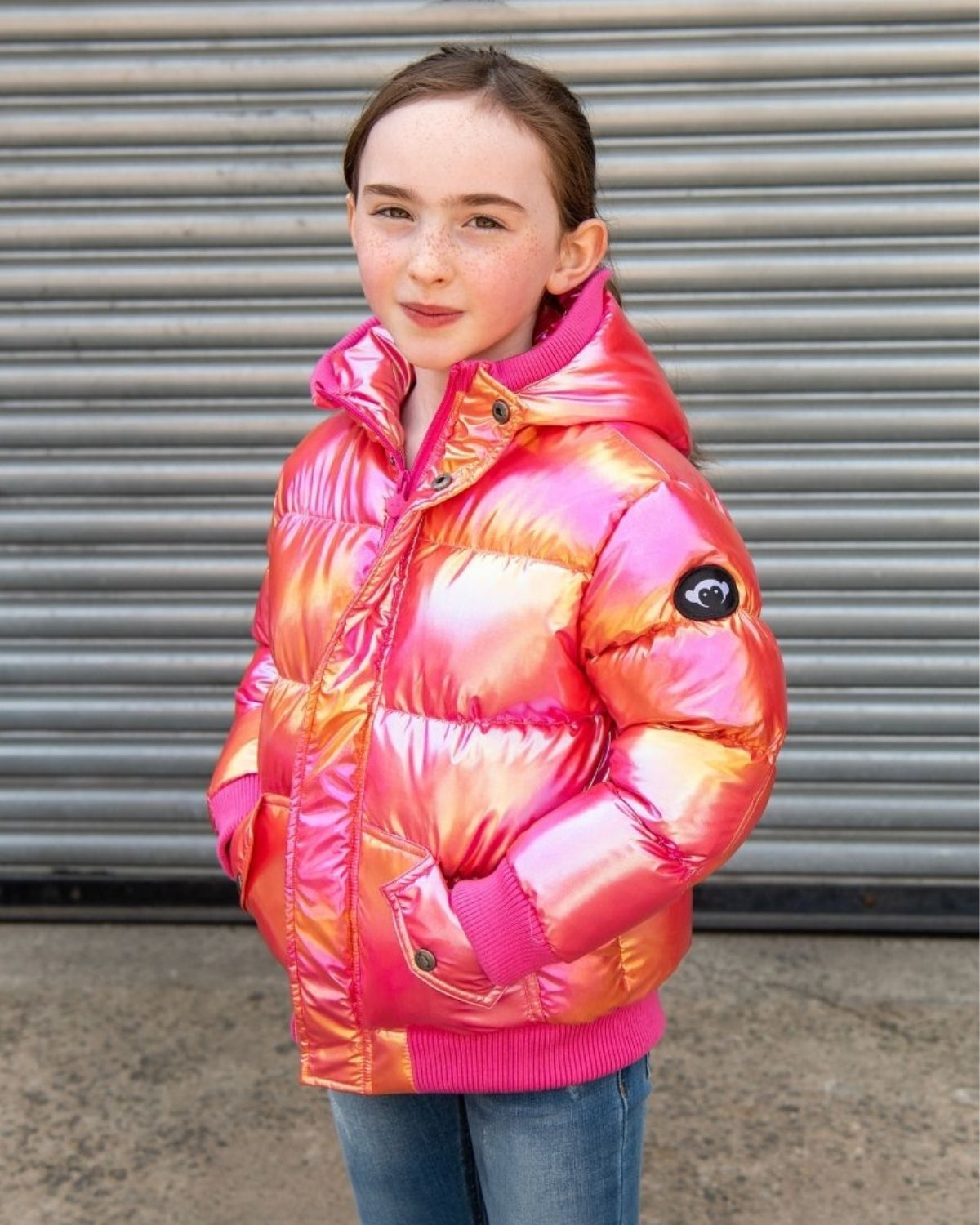 Stylish girl in a vibrant Citrus Sparkle Puffy Coat, perfect for winter adventures and making bold fashion statements!
