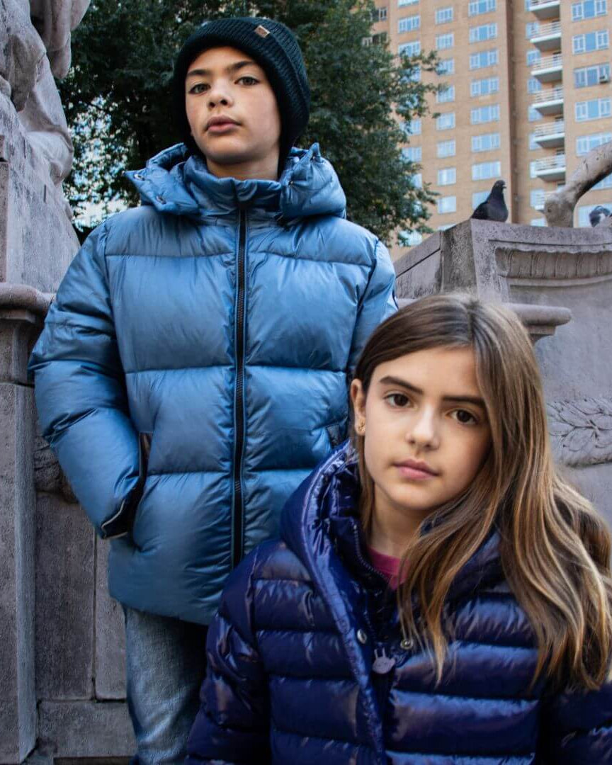 Stylish kids in cozy blue Lovi Long Puffers, ready for winter adventures in high-quality kids clothes.