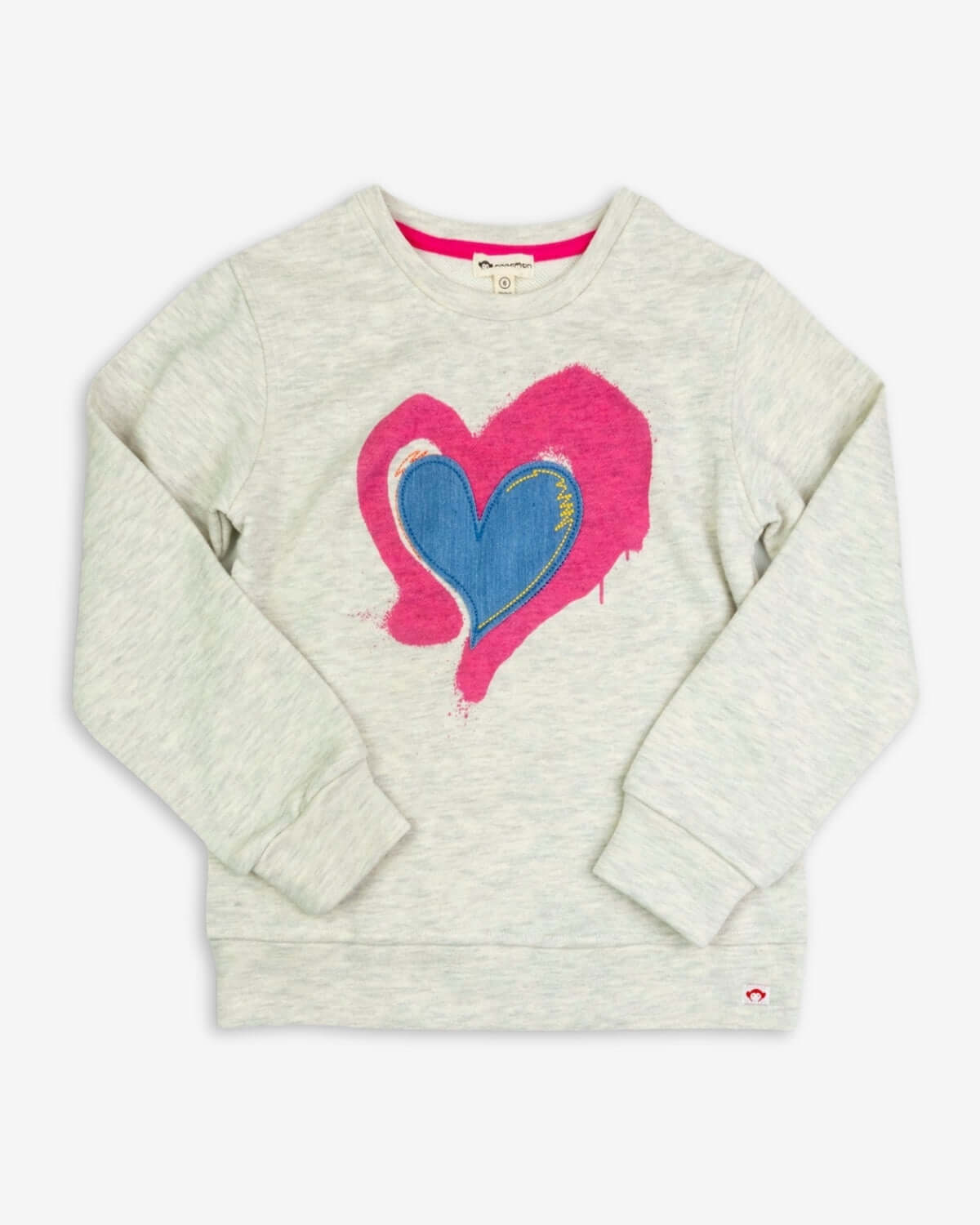 Stylish kids' sweatshirt with playful pink heart design, perfect for trendy boys and girls back to school.
