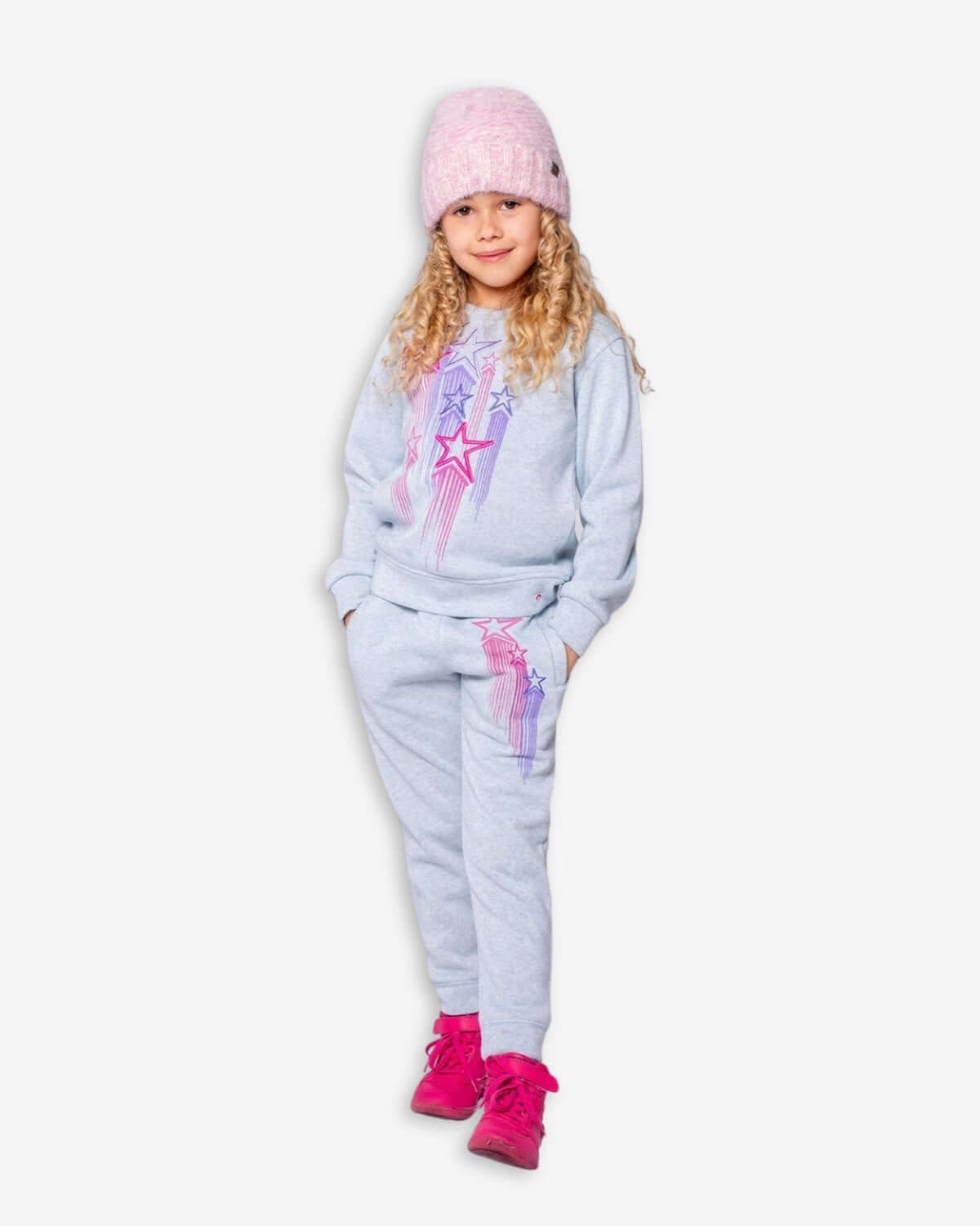 Stylish girl rocking a soft heather grey sweatshirt and matching sweatpants, ready for back to school fun!