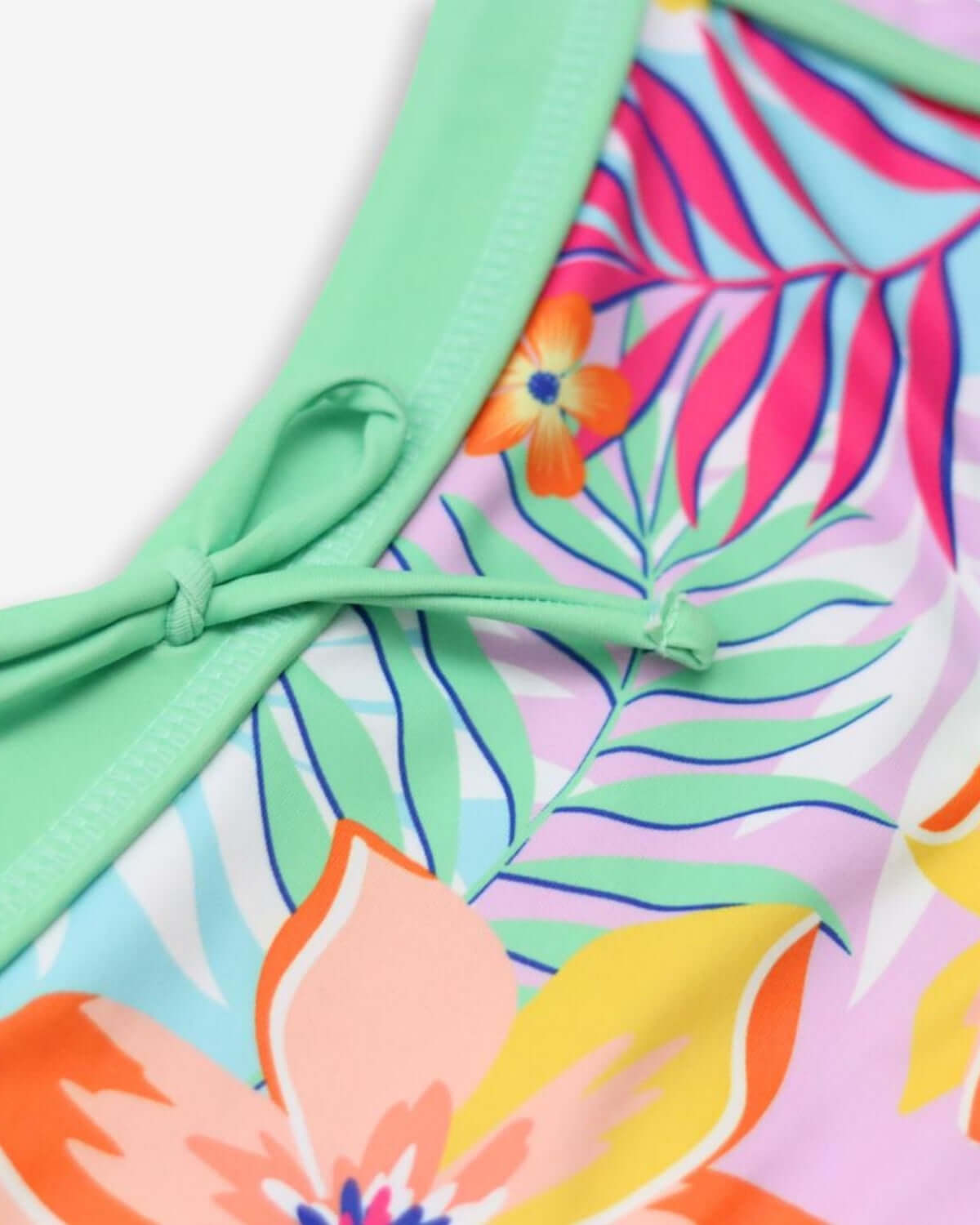 Vibrant floral design of Retro Tropics Stella Bikini showcasing bright colors and playful details for kids' summer fun.