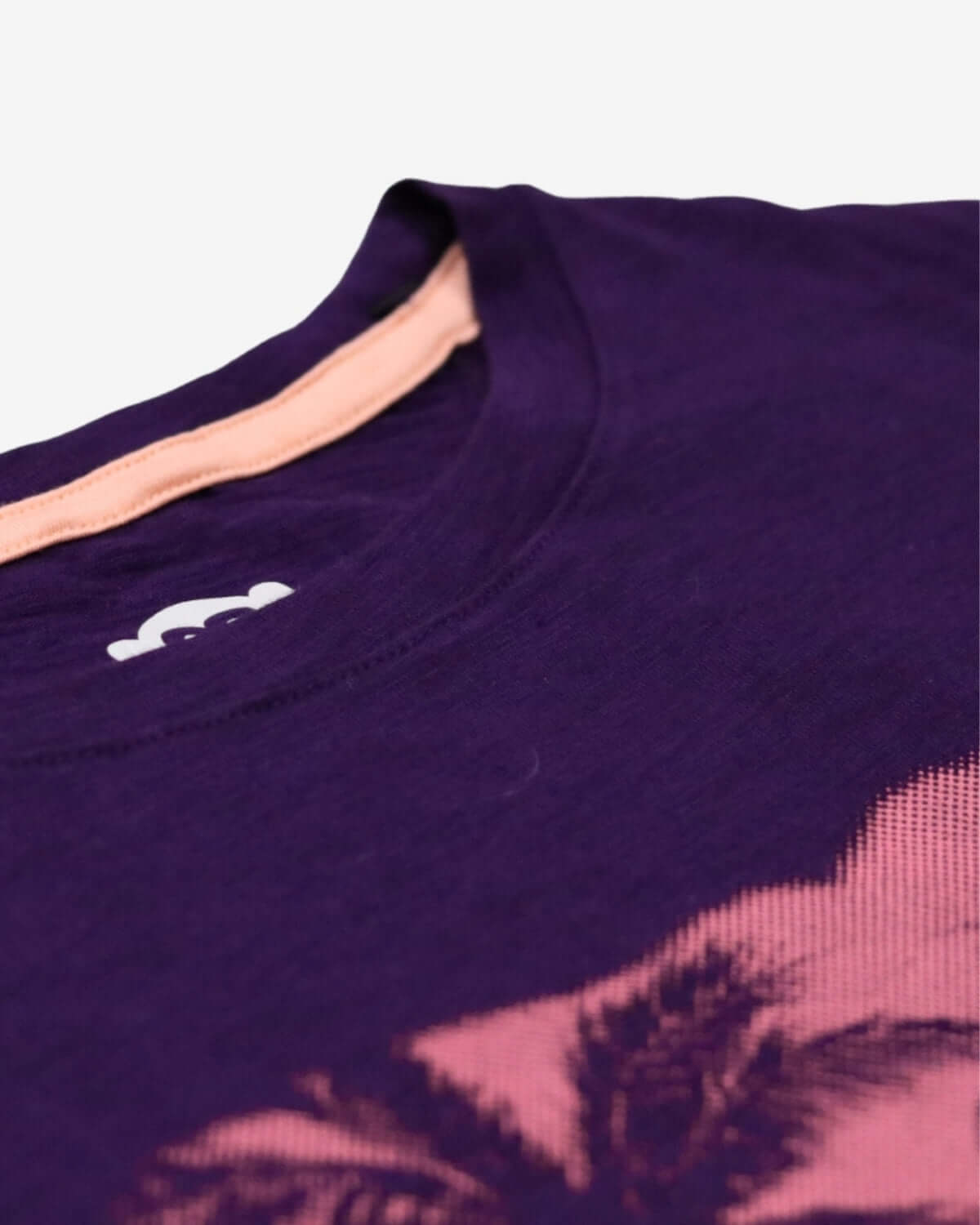 Close-up of soft dark violet tee with palm tree sunset design, a stylish choice for kids clothes, perfect for back to school.
