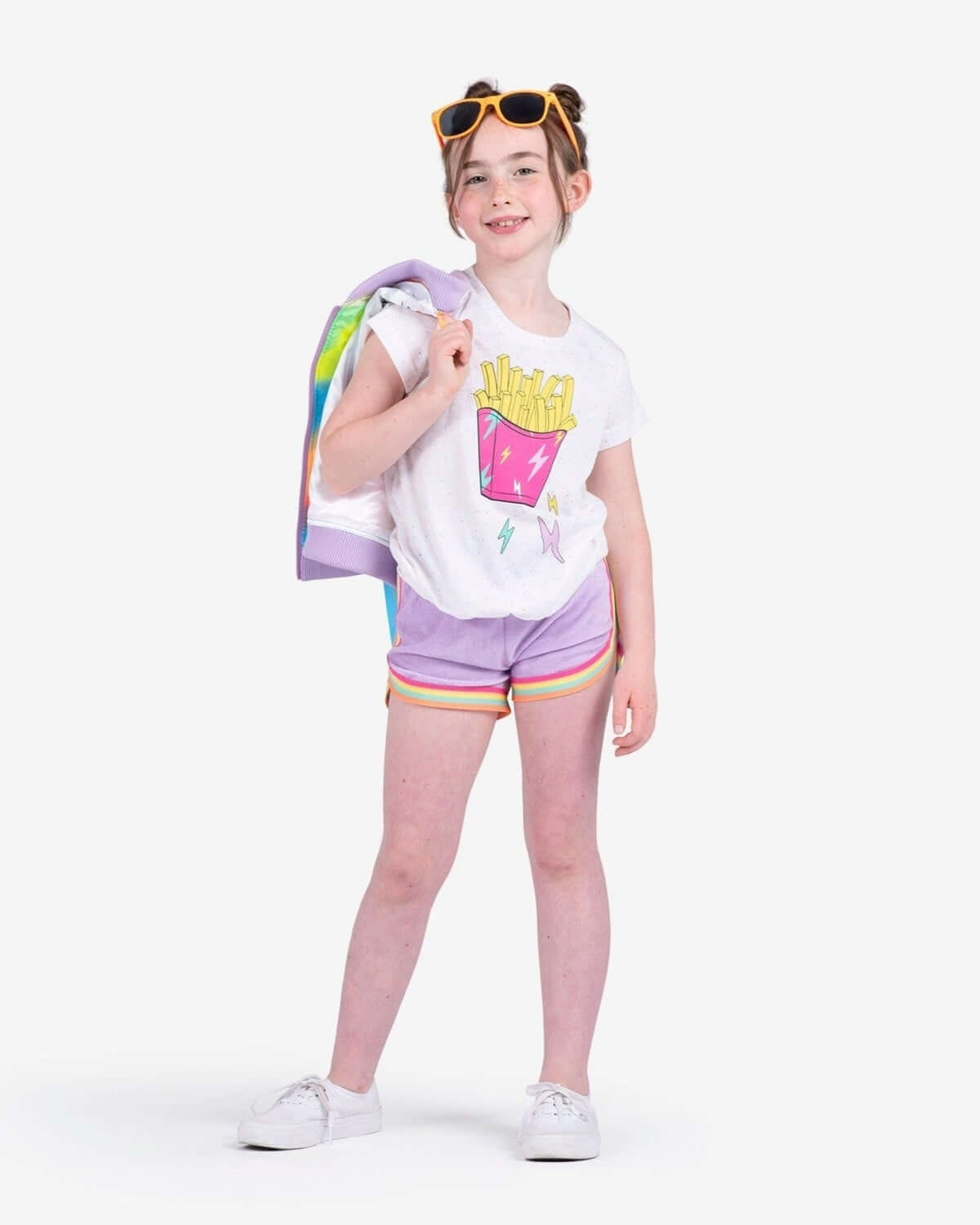 A stylish girl in a fun fry graphic tee, rocking purple shorts and sunglasses—a delightful back-to-school outfit!