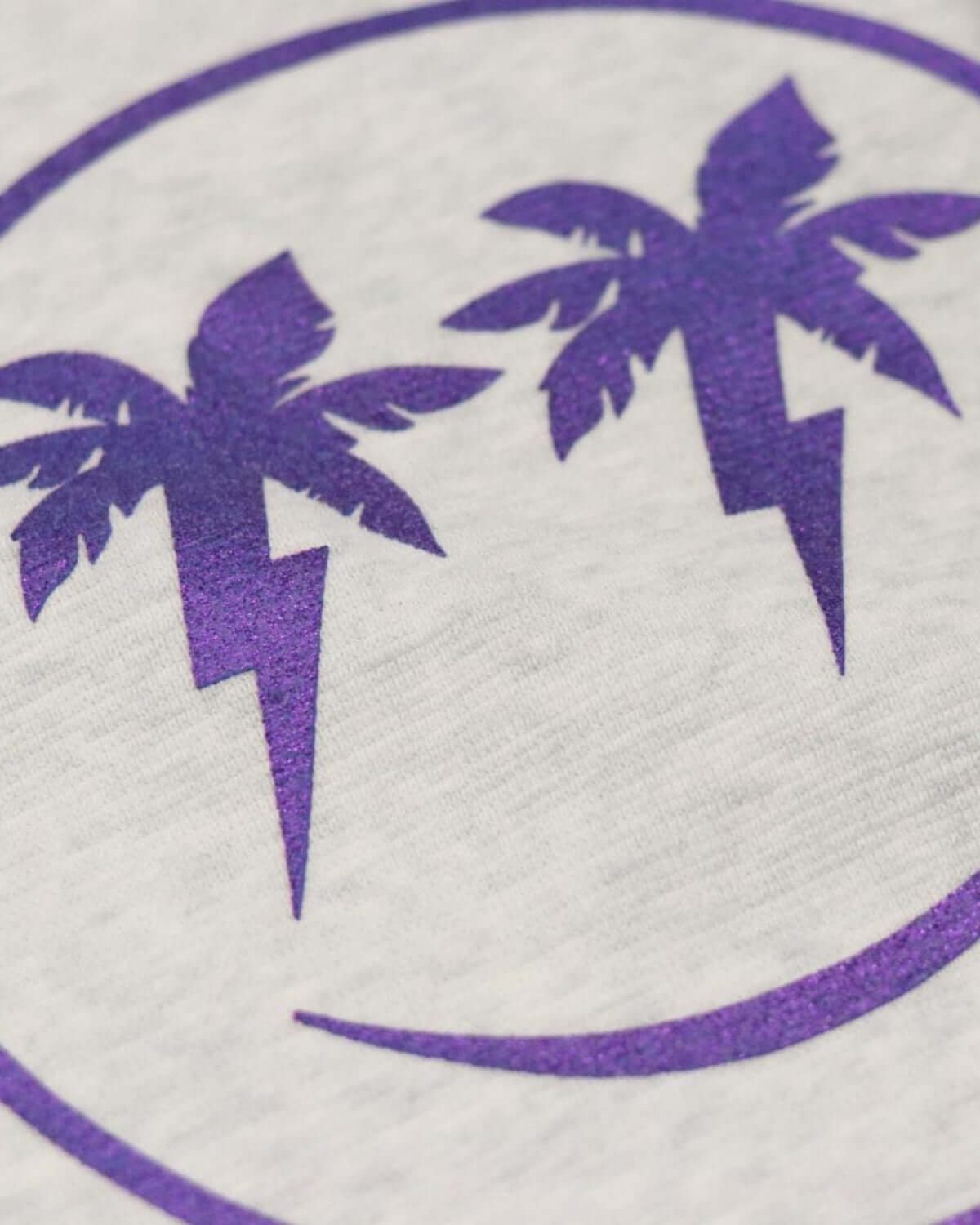 Fun purple palm tree smiley face graphic on a soft kids' sweatshirt, perfect for stylish beach days!
