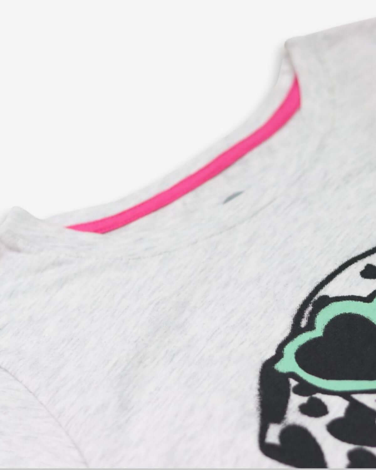 Stylish Girls Callaway Tee with chic Dalmatian design and vibrant pink neckline, perfect for trendy kids clothes.