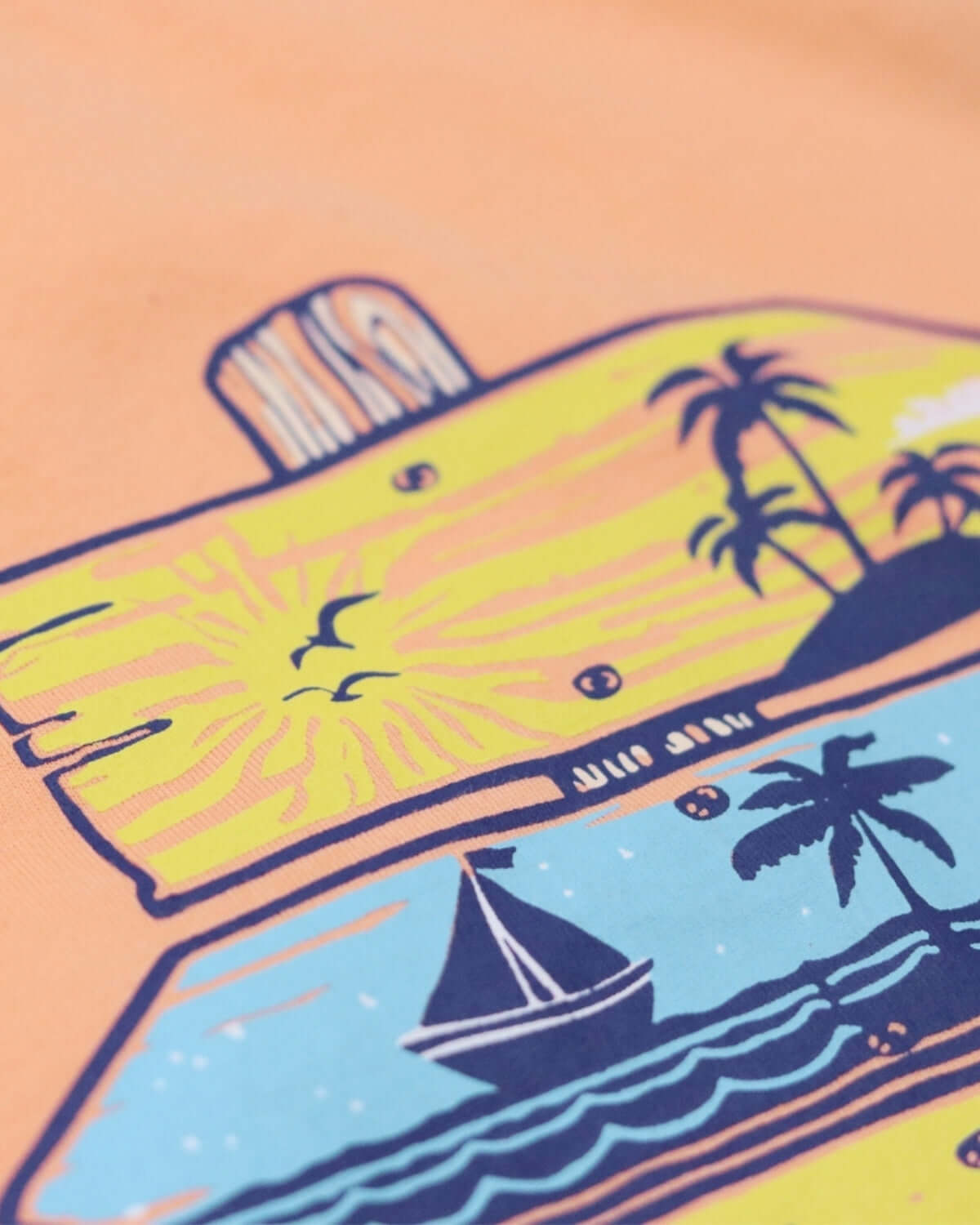 Sunset paradise graphic on soft peach tee, ready for fun adventures in high-quality kids clothes.