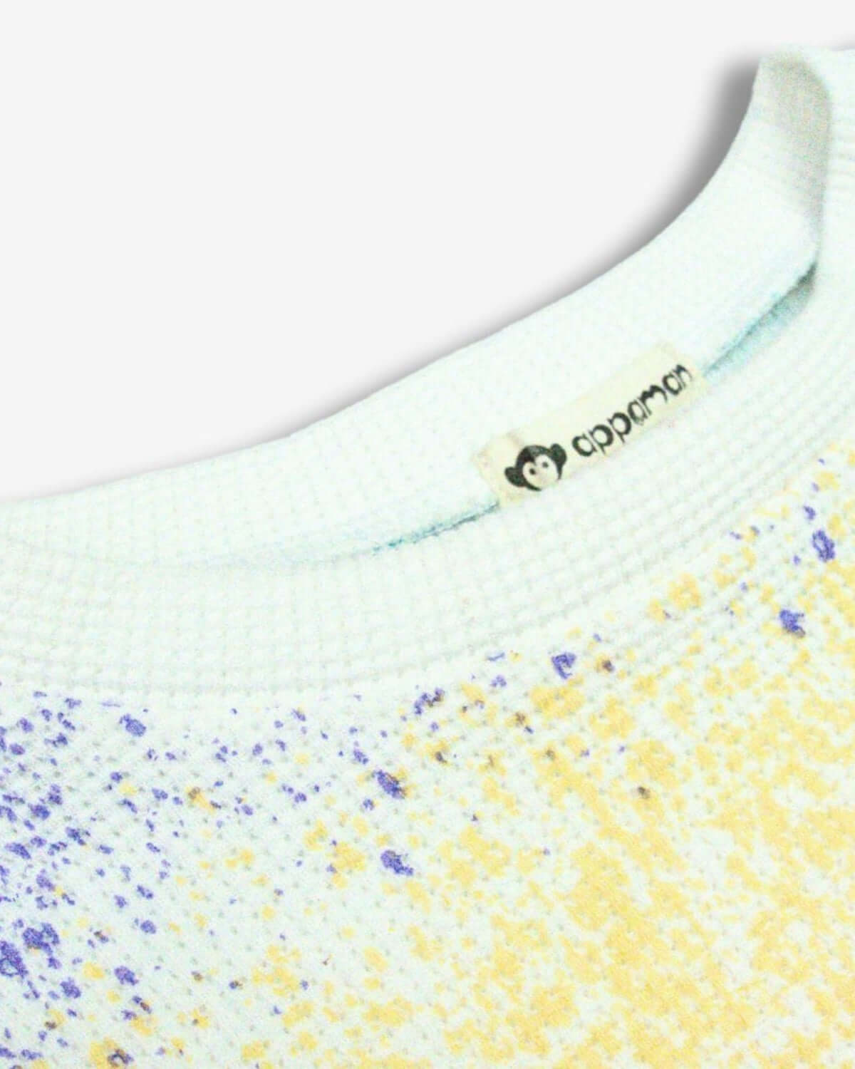 Close-up of Appaman's Splatter Print Sofia Top, showcasing vibrant colors and cozy waffle texture—perfect for creative kiddos!