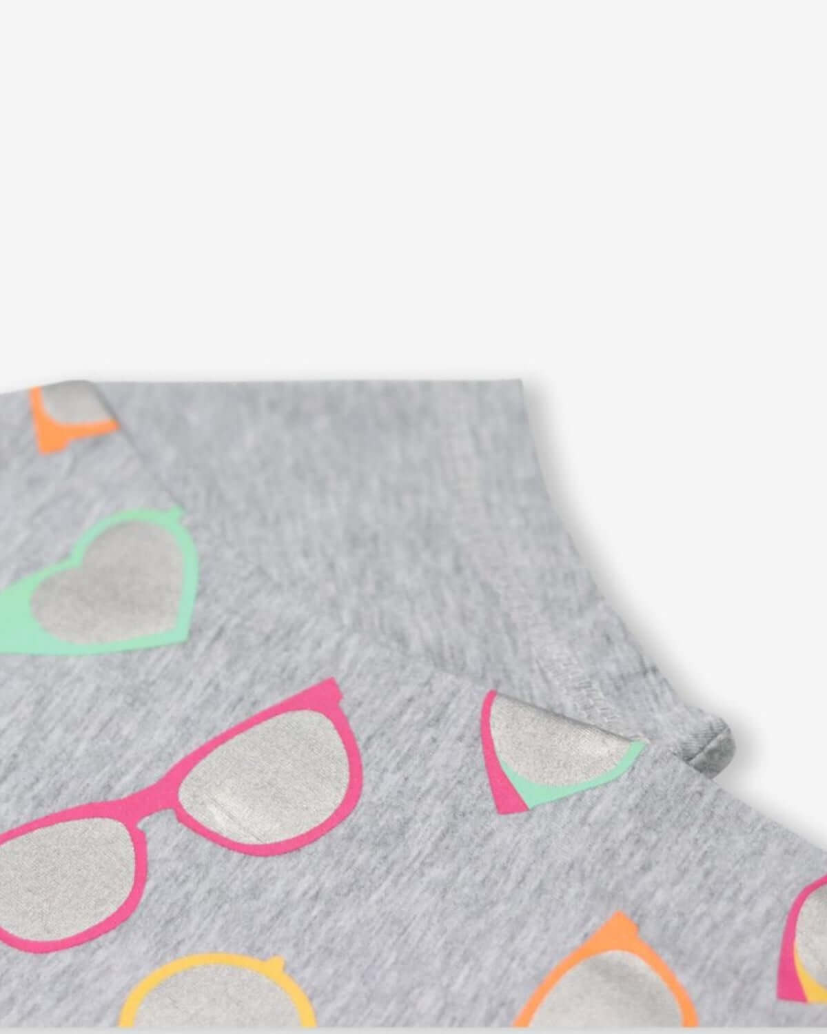 Light grey circle tee featuring colorful sunglasses print—perfect addition for trendy kids clothes this back to school!