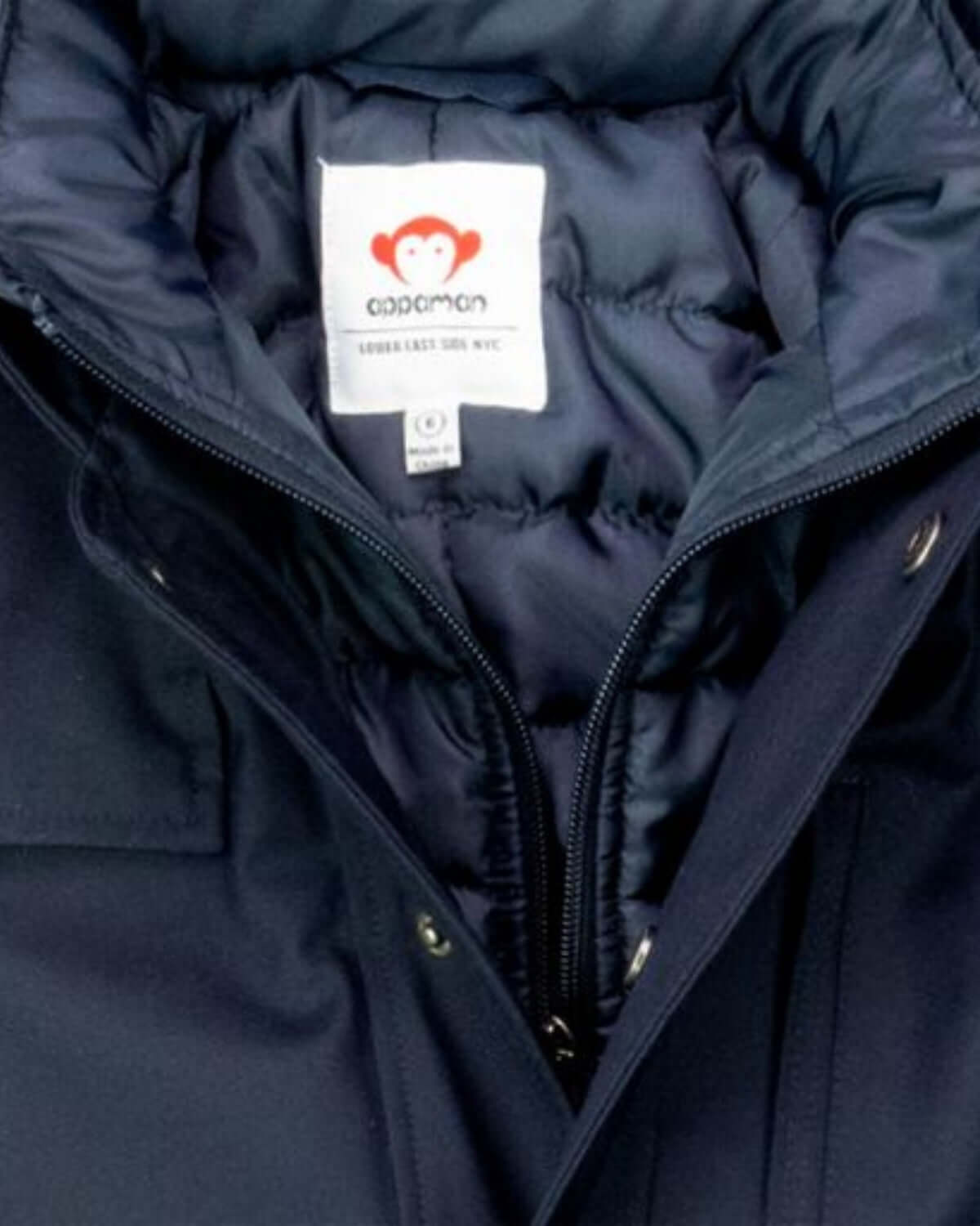 Navy Blue Gotham Coat interior view with label, premium materials and modern design for stylish boys.