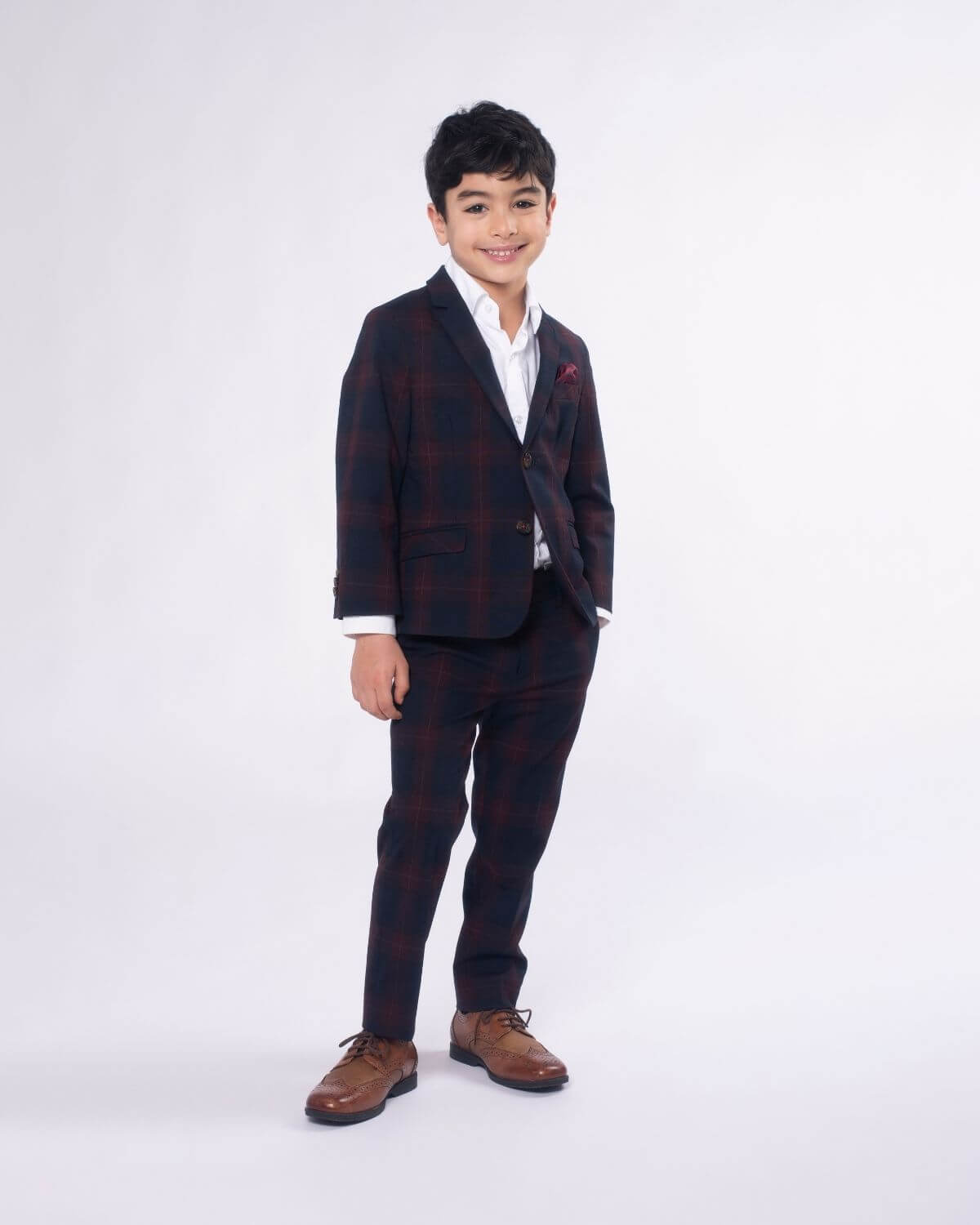 Dapper kid in a Navy/Cranberry plaid suit, blending boyish charm with stylish comfort for back to school and special events.