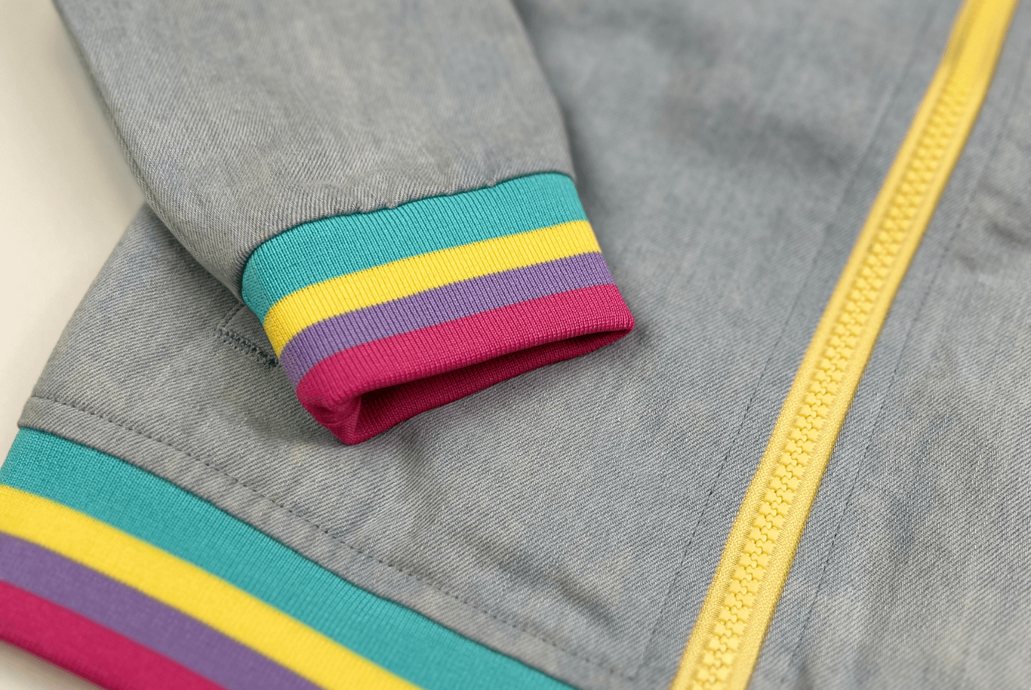 Stylish kids jacket cuff with vibrant colors, perfect for adding flair to any outfit this spring.