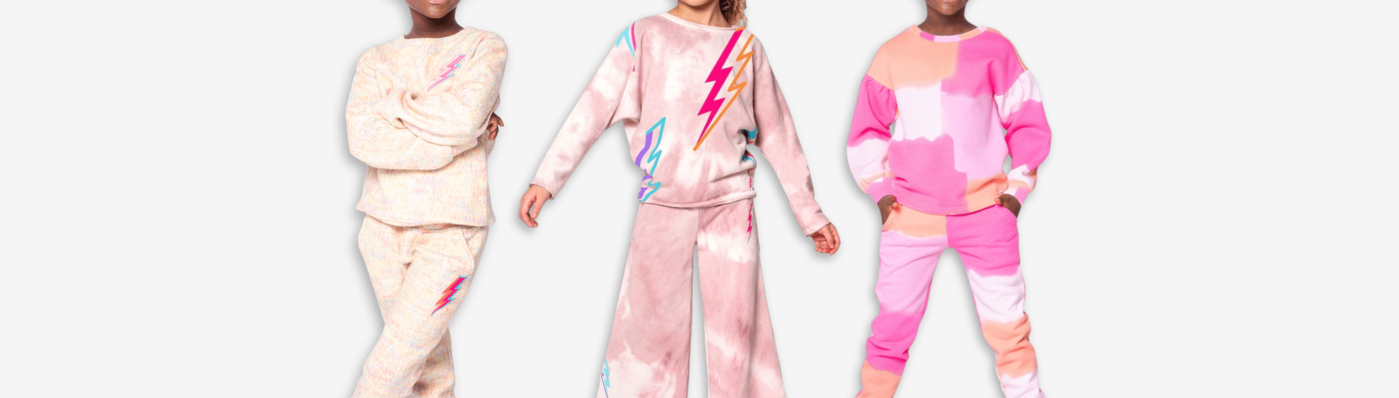 Three stylish girls' sets in vibrant colors and playful patterns, showcasing fun and trendy kids' fashion.