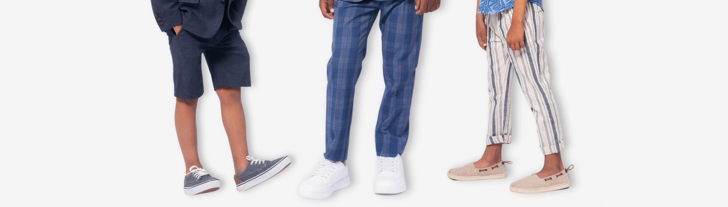 Stylish boys' spring bottoms perfect for playful adventures and stylish outings, featuring shorts, plaid, and striped pants.