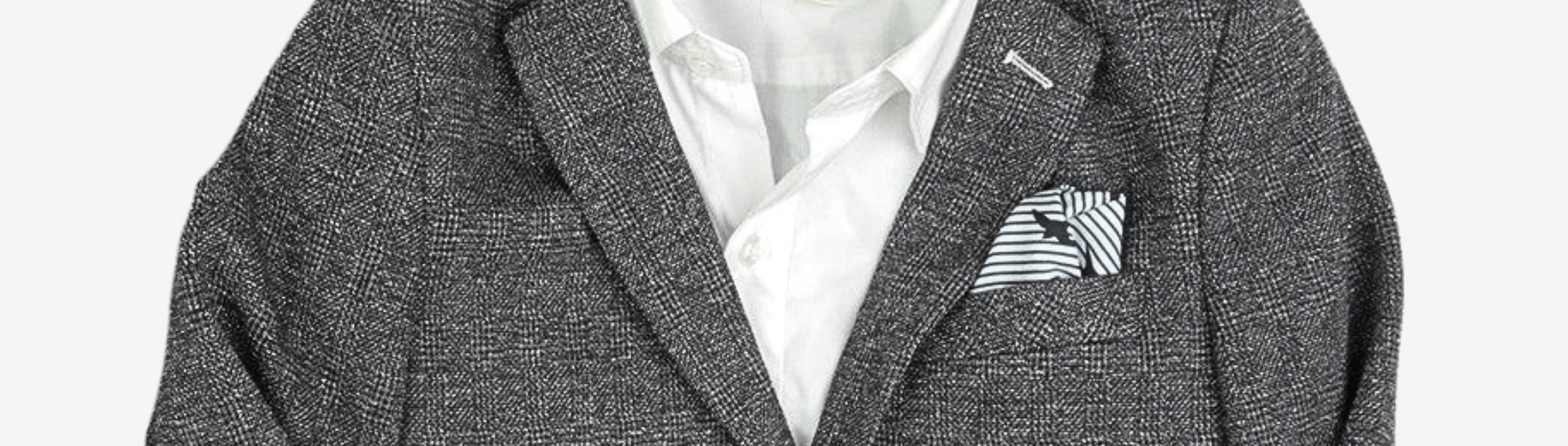 Stylish grey blazer with a crisp shirt and a playful pocket square, perfect for kids' sophisticated looks.