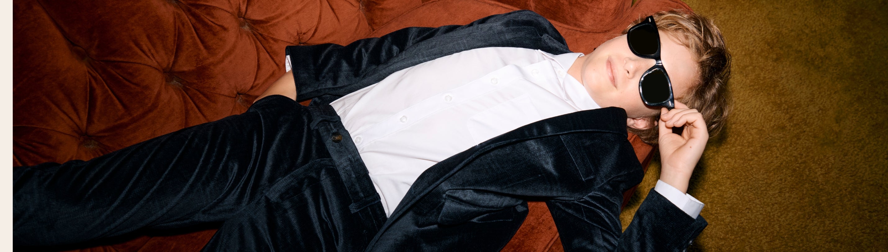 boy wearing a velvet suit