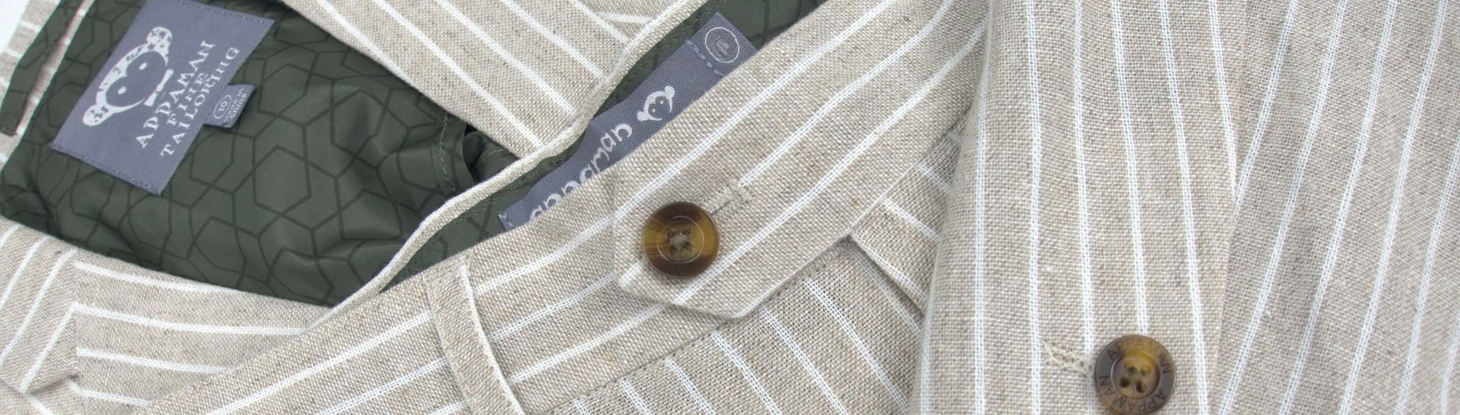 Stylish striped linen suit detail with buttons and lining, perfect for kids' wedding fashion.