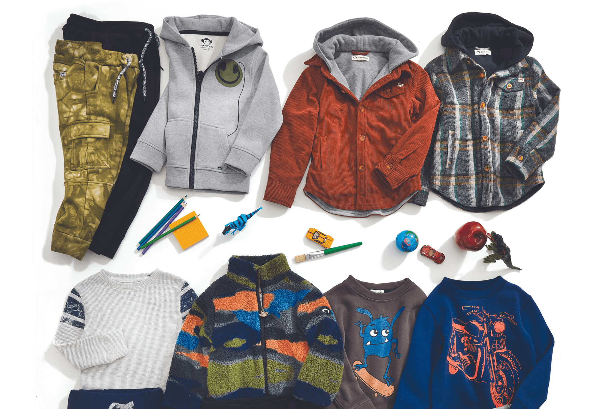 Stylish kids clothing collection featuring cozy hoodies, playful jackets, and fun patterns, perfect for school adventures.