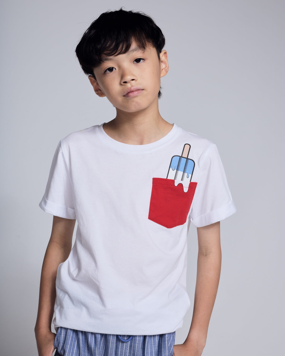 Boys' Tops - Trendy boy in plaid jacket and beanie showcasing stylish and comfortable fashion from Appaman.