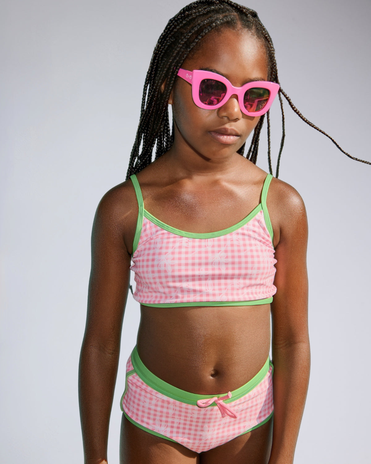 Girls' Two Piece Swimsuits featuring colorful floral designs on stylish tankini and bikini sets.