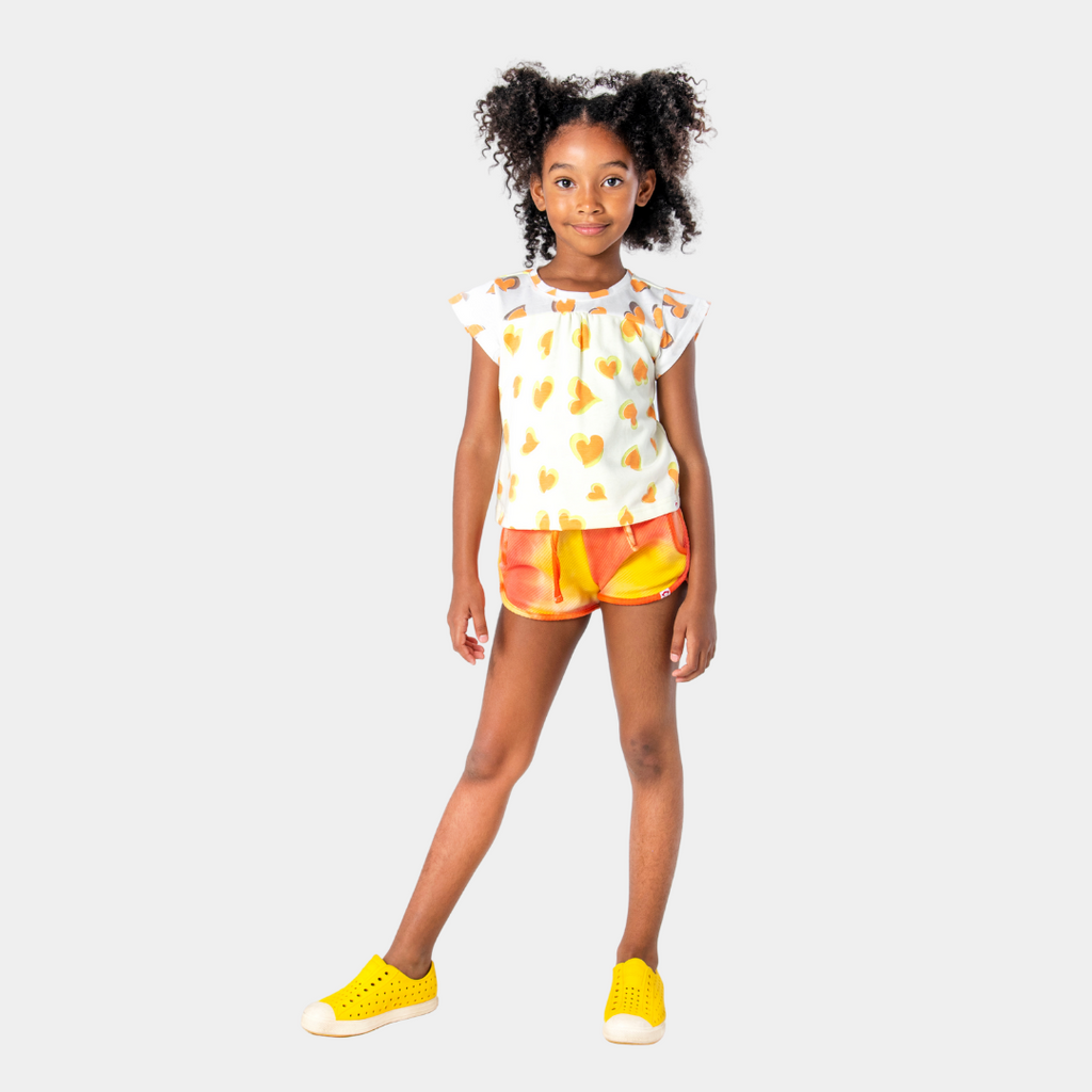 Girl Wearing Shirt and Shorts for Girls from Appaman Kids Clothes