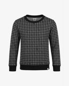A long-sleeve crewneck sweater featuring a black and gray houndstooth pattern, with solid black ribbed cuffs, collar, and hem, displayed on a light gray background.