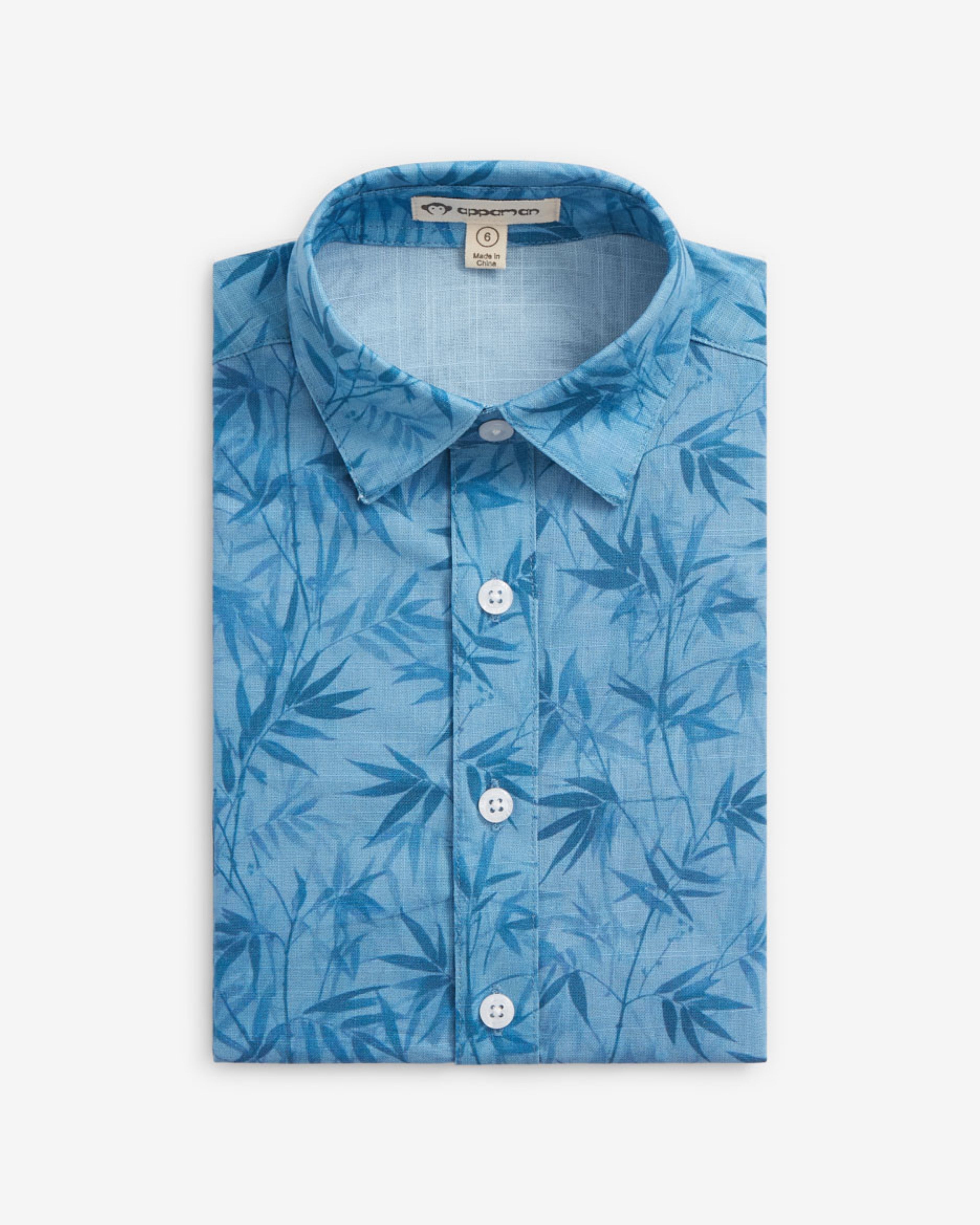 Blue Bamboo Day Party Shirt folded with a spread collar and bamboo print design, ideal for warm-weather celebrations.