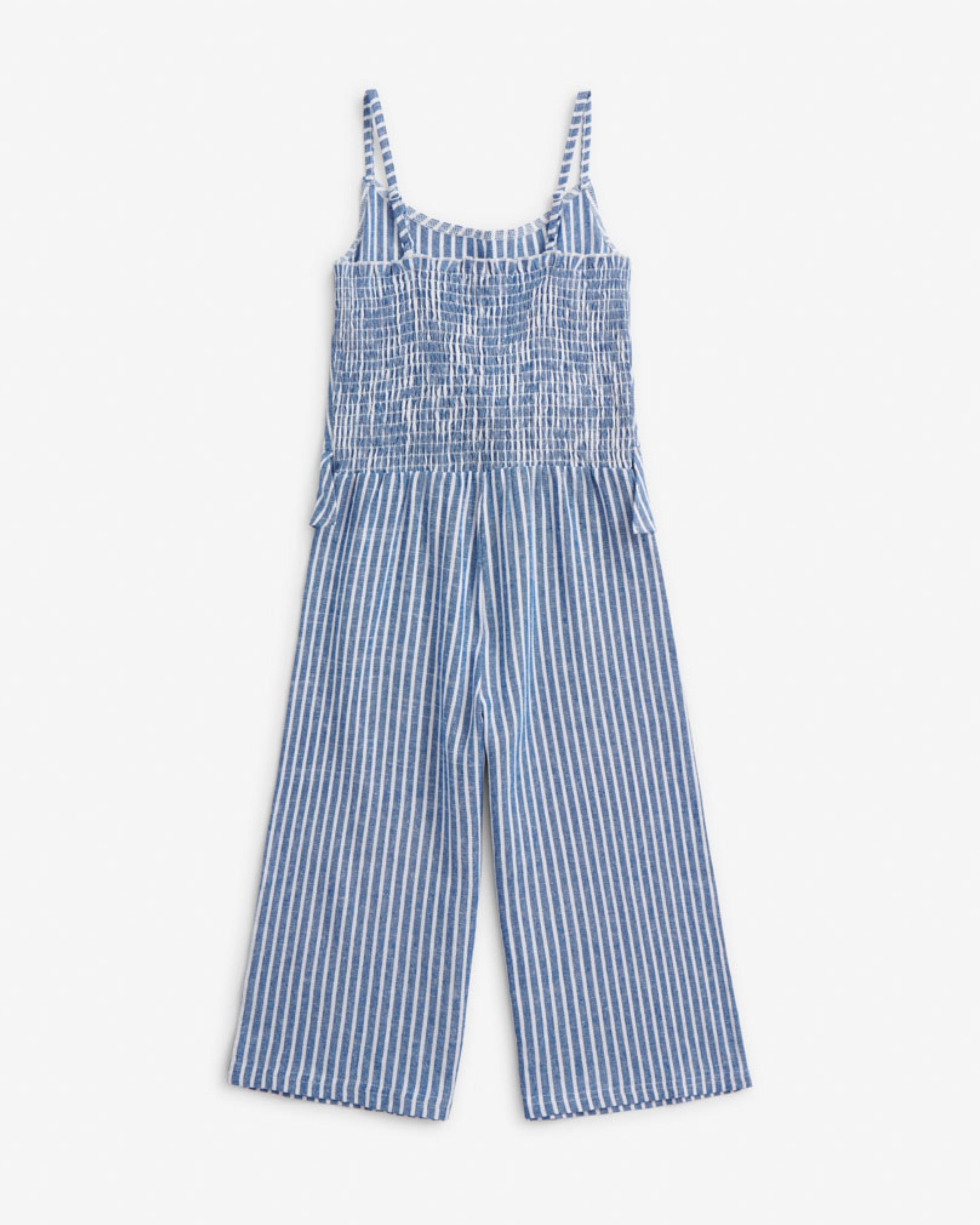 Canopy Stripe Blue Bow Jumpsuit with a tie front bow in breathable linen blend and playful stripes.