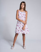 Daisies Leah Layered Dress on a girl with floral print and layered details, perfect for sunny days and parties.