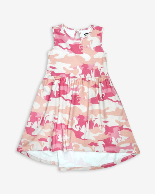 a pink and white dress with horses on it
