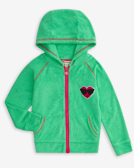 a green jacket with a pink heart on it