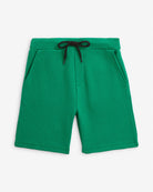 Garden Green Resort Short in bright green color, featuring a drawstring and pockets for comfort and practicality.