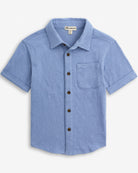 Glacier Lake Beach Shirt in light blue with a classic collar and button details, perfect for warm weather.