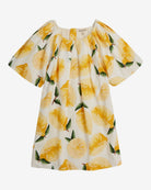 Dress with lemon pattern on a white background