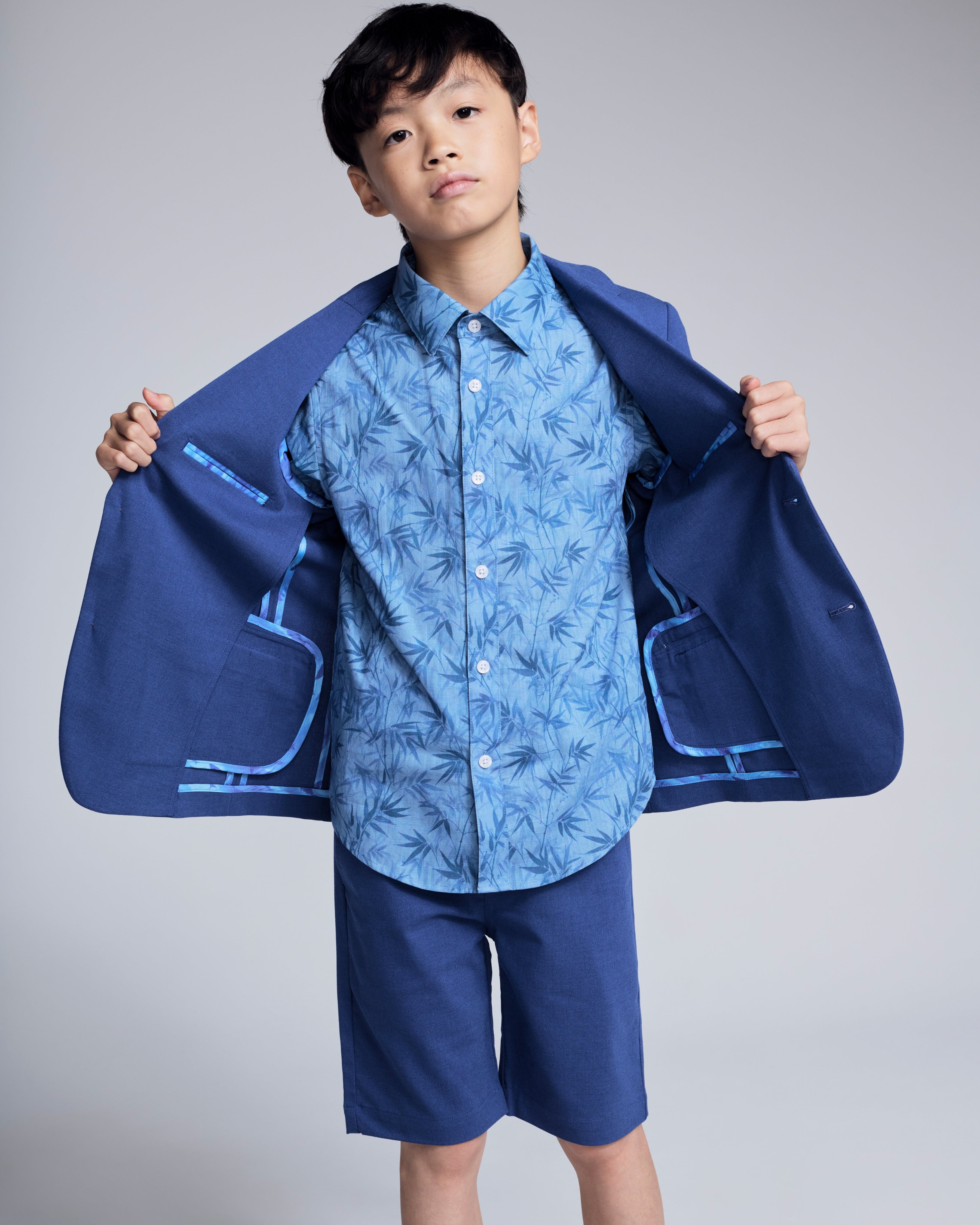 Linen Canopy Blue Sports Jacket worn by a boy, showcasing its classic style and breathable fabric.