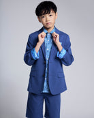 Linen Canopy Blue Sports Jacket paired with a blue patterned shirt and shorts, stylish for spring events.