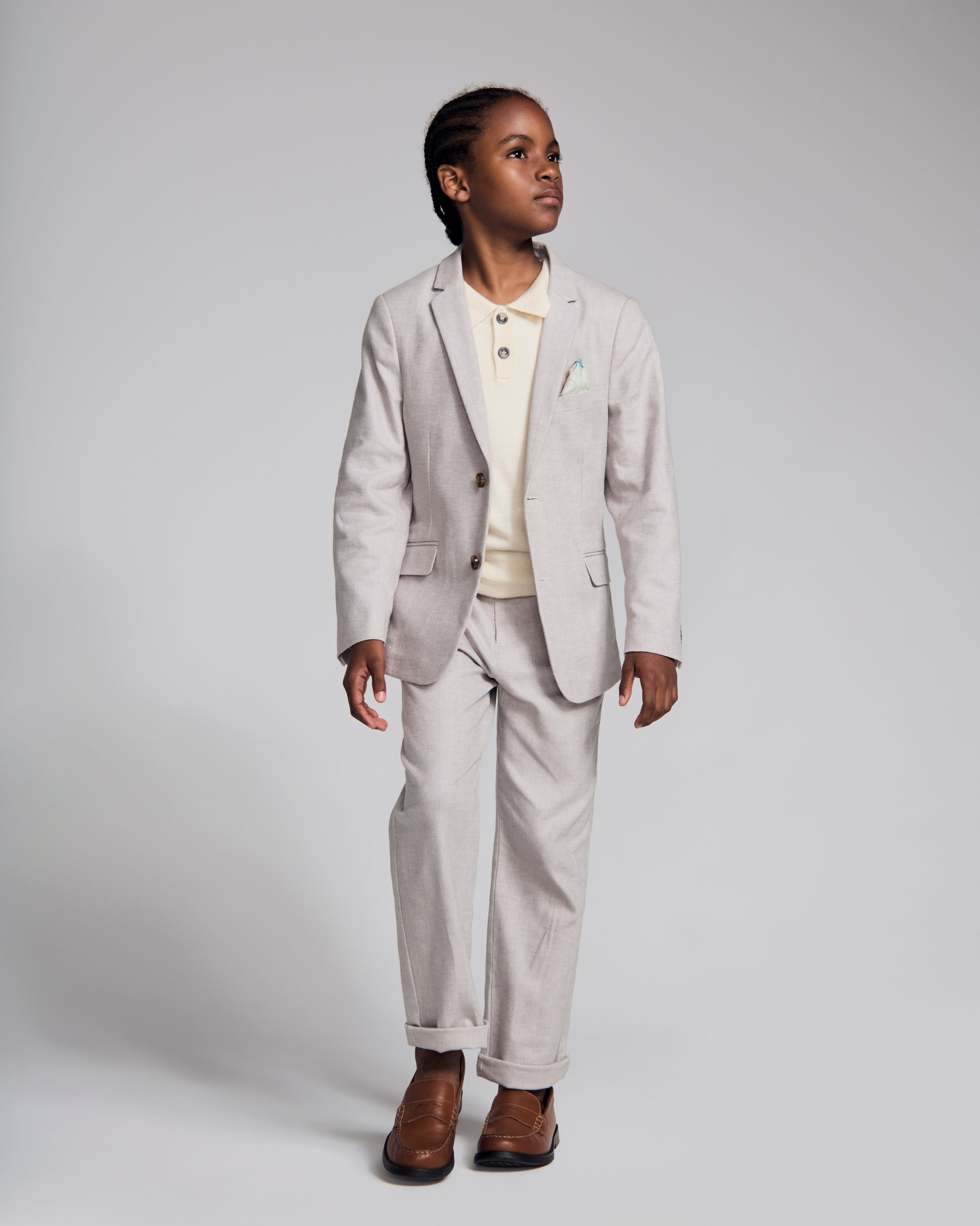 A boy wearing the Linen Grey Beach Pant with a matching Linen Grey Sports Jacket, stylish outfit for warm weather.