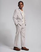Linen Grey Beach Pant paired with a stylish sports jacket for a polished summer outfit.